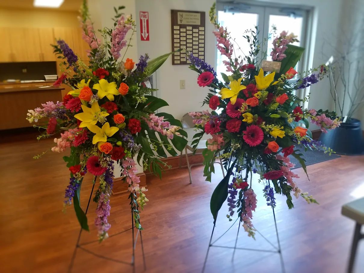 Designer’s Choice Sympathy Standing Spray- Cheery
