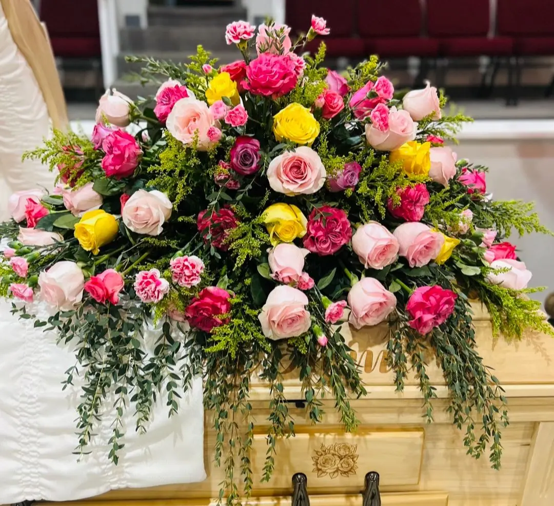 Reds and yellows casket spray Reds and yellows casket spray