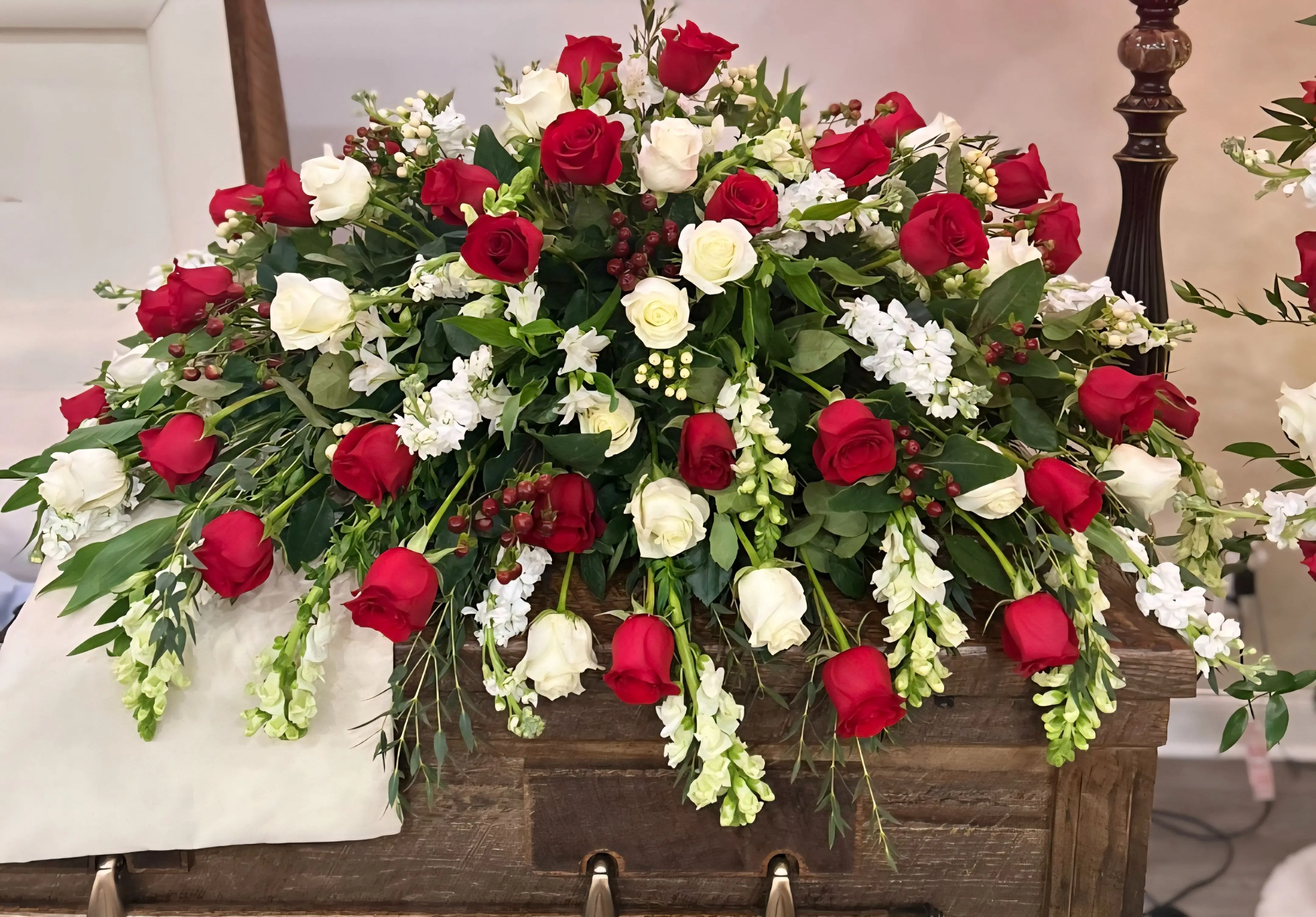 Red and white casket spray Red and white casket spray