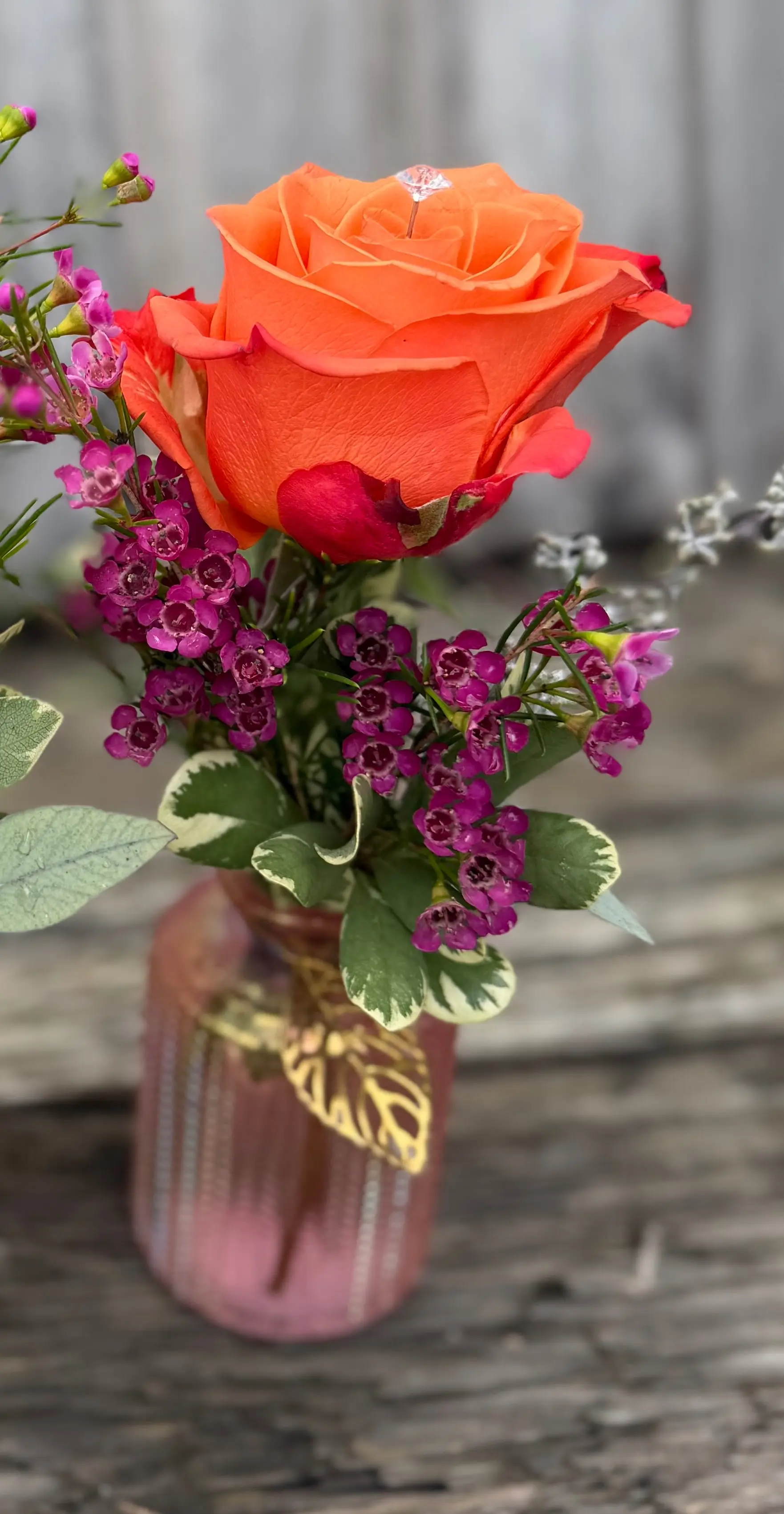 Orange rose bud vase Orange rose bud vase