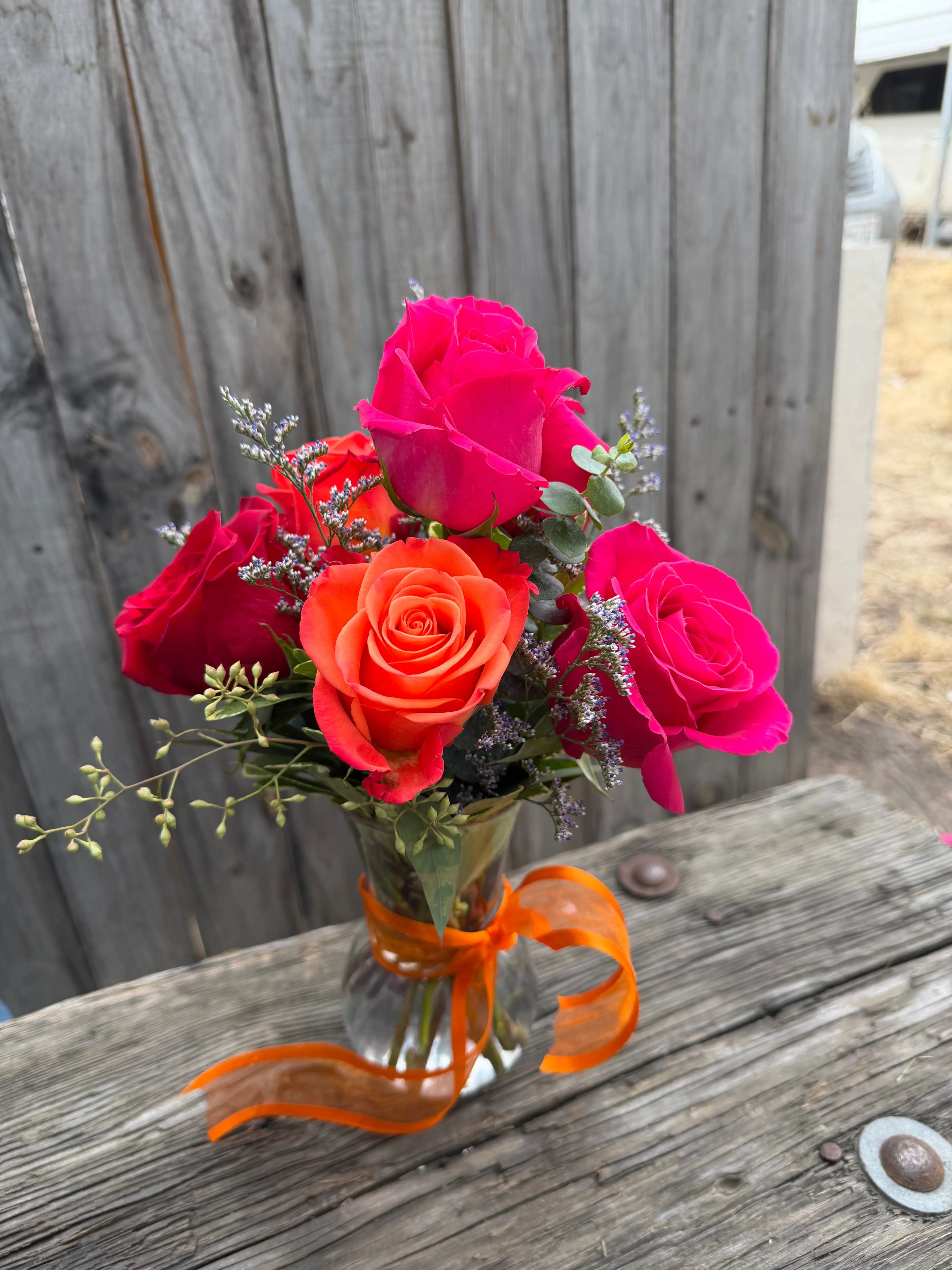 Six mixed color roses