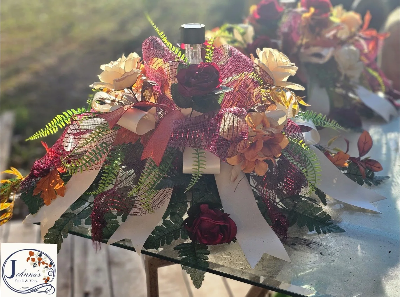Silk Spray On A Brick With Solar Light Silk Arrangement Silk Spray On A Brick With Solar Light Silk Arrangement