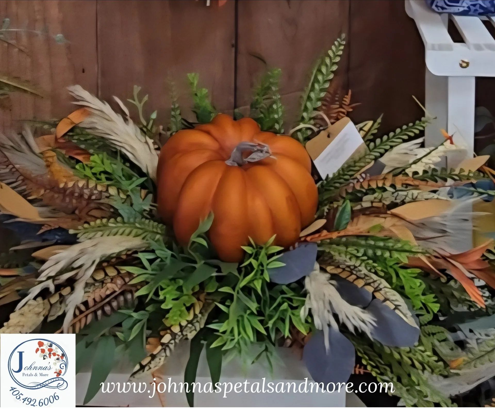 Fall Pumpkin Arrangement with feathers