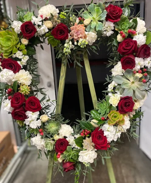 Succulents and Roses Heart standing spray Succulents and Roses Heart standing spray