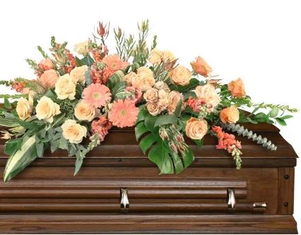 Compassionate Coral Casket Spray