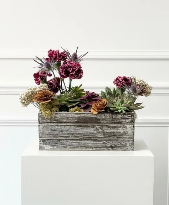 Tranquil Grove Succulent garden with fresh flower accents Tranquil Grove Succulent garden with fresh flower accents