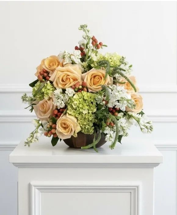 Peach Fizz Peach roses, green hydrangea, hypericum, veronica